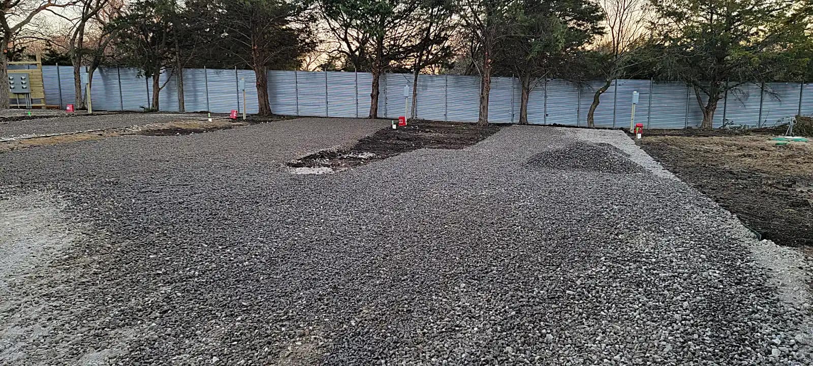 Crushed stone base being laid to form RV spots