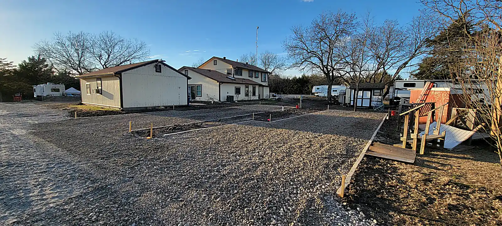Completed clean concrete pathways for RV additions