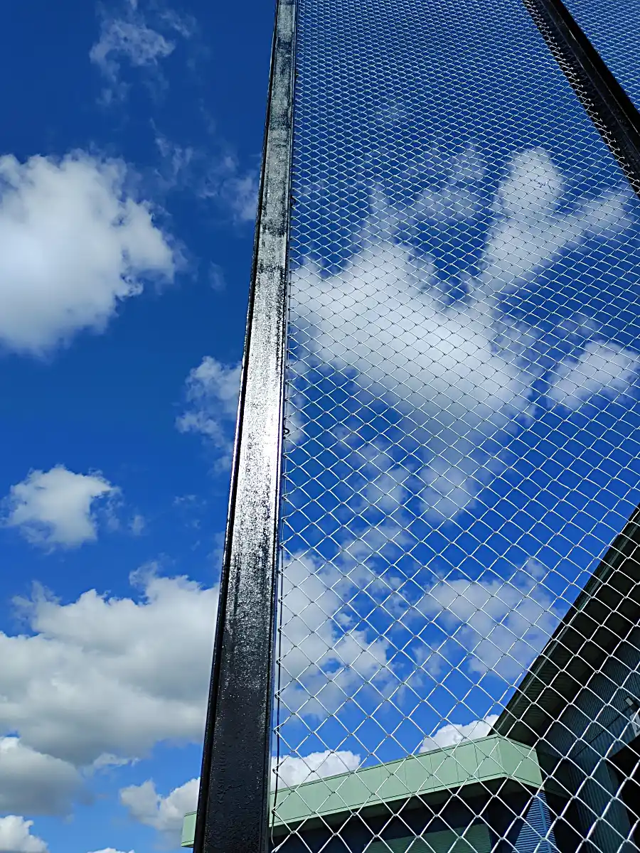 Welding horizontal crossbars to metal fence posts