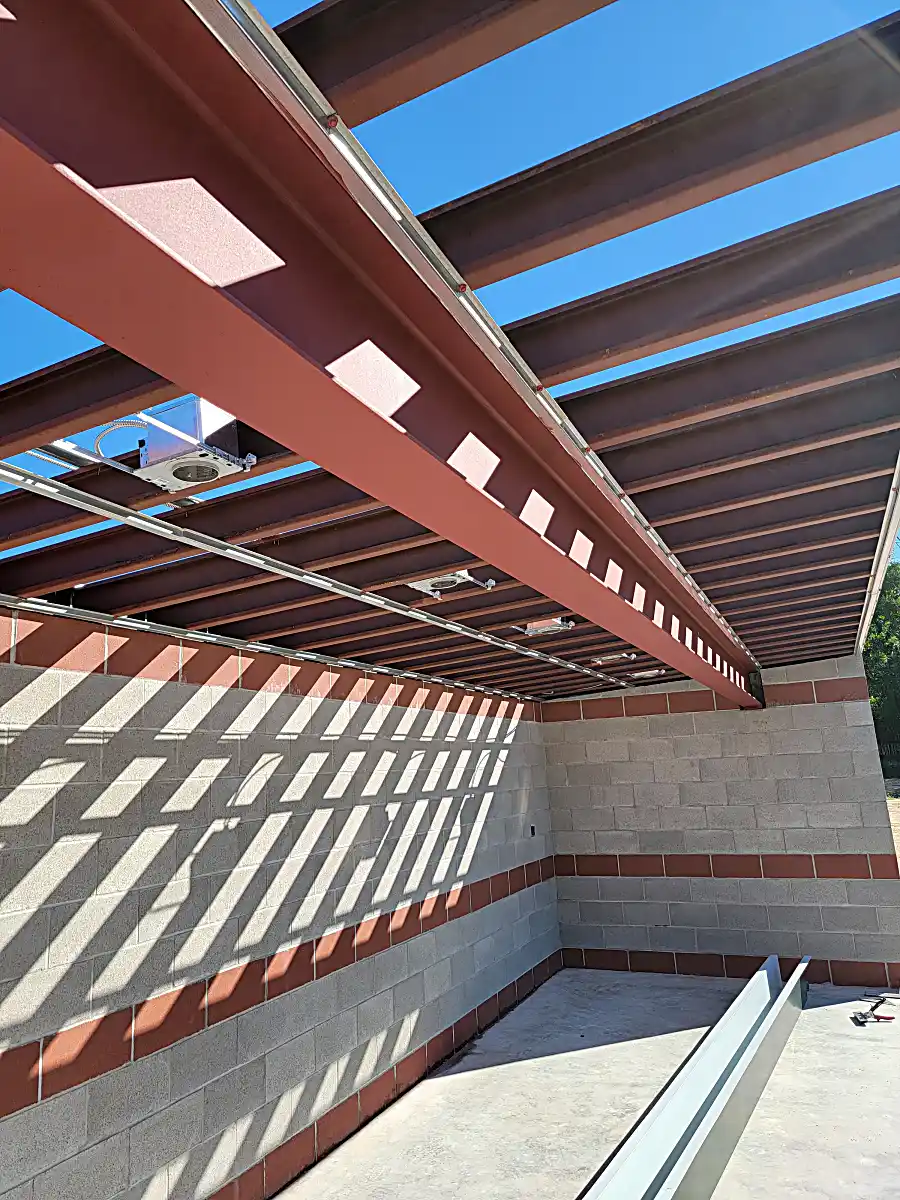 Vertical view of steel roof beams for dugout