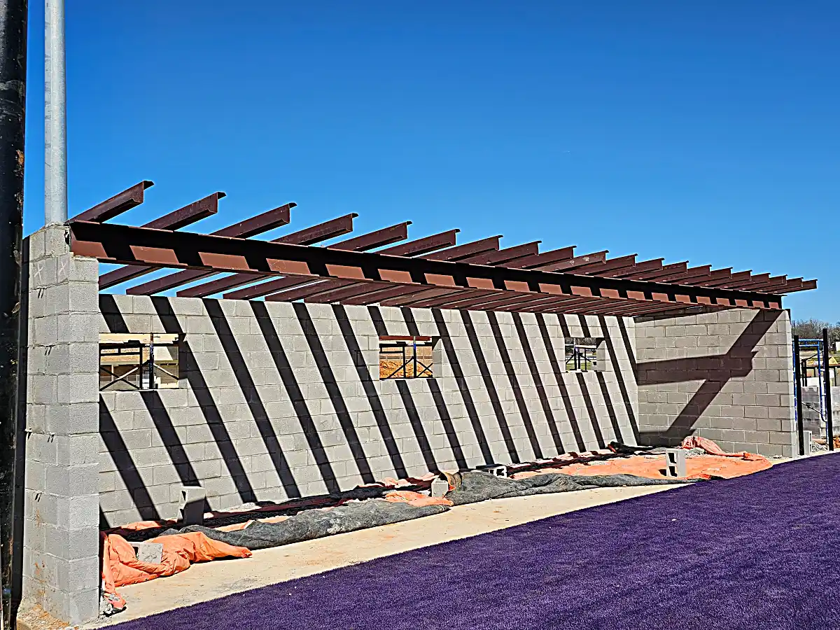 Long angle view of welded dugout structure