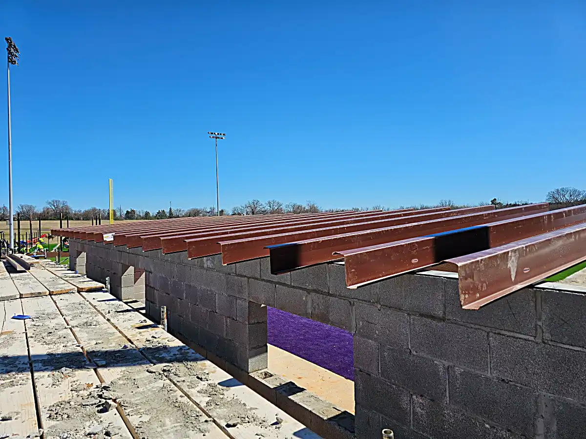 High school athletic facility dugout framing