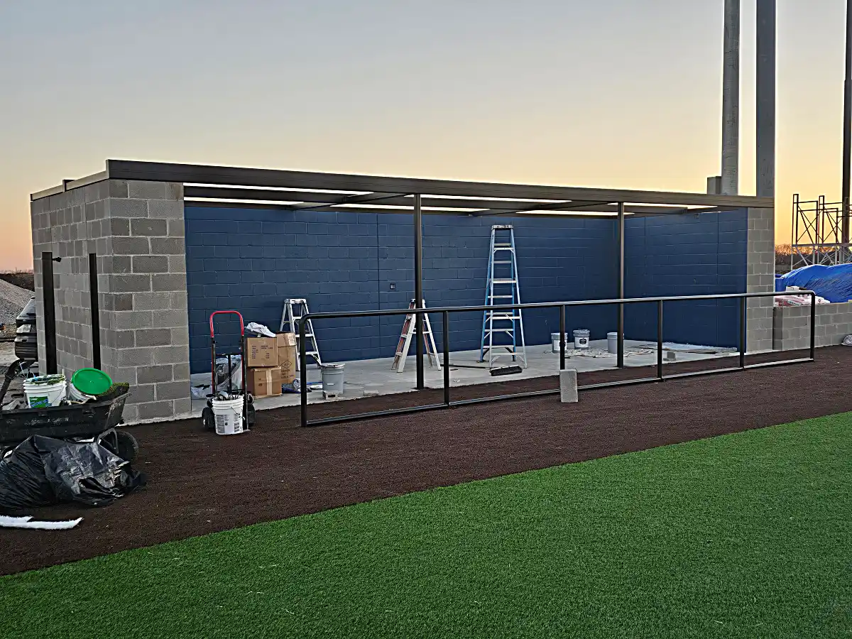 Completed masonry work on steel dugouts