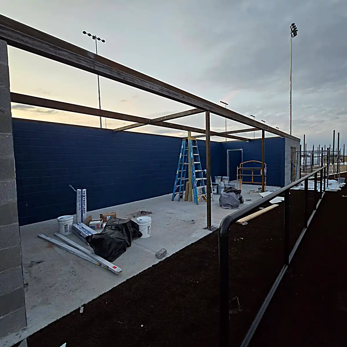 Dugout support posts at dusk