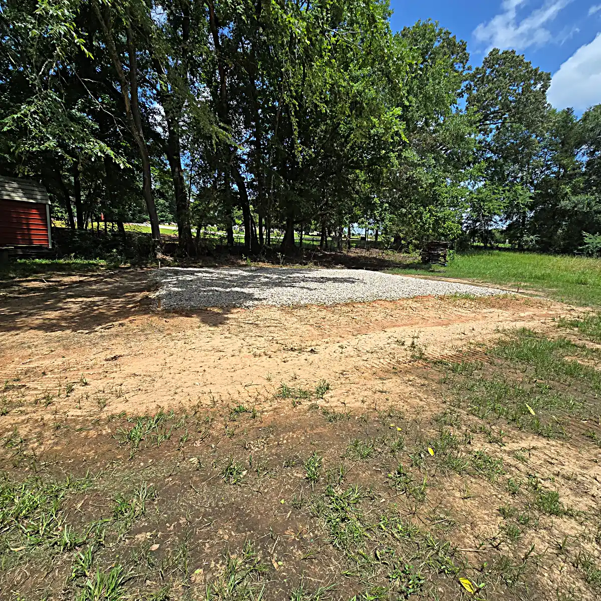 Compacted structure pad site for metal building