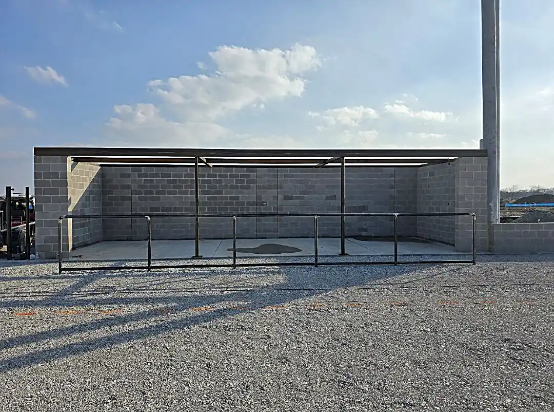 Dugout block wall during early sunset
