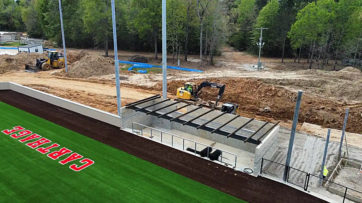 Welded athletic steel dugout with standing seam roof