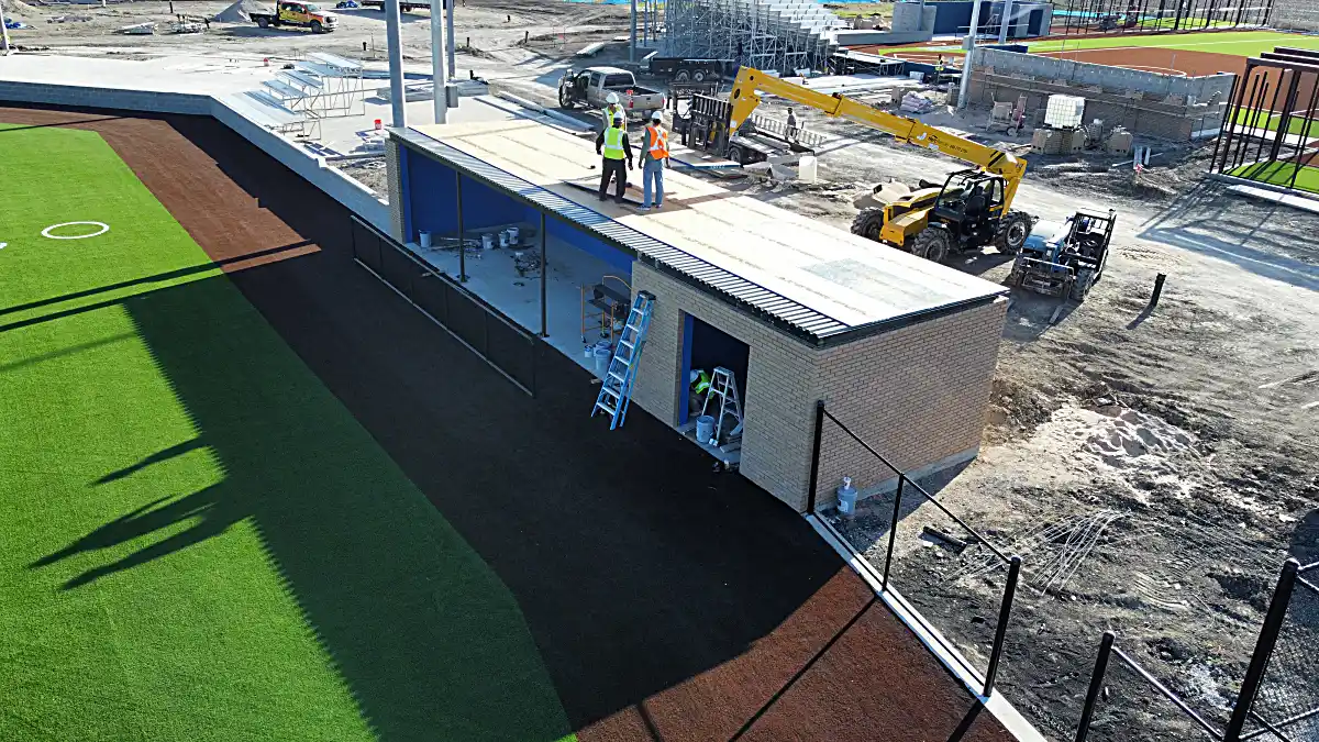 High school dugout and practice area drone view